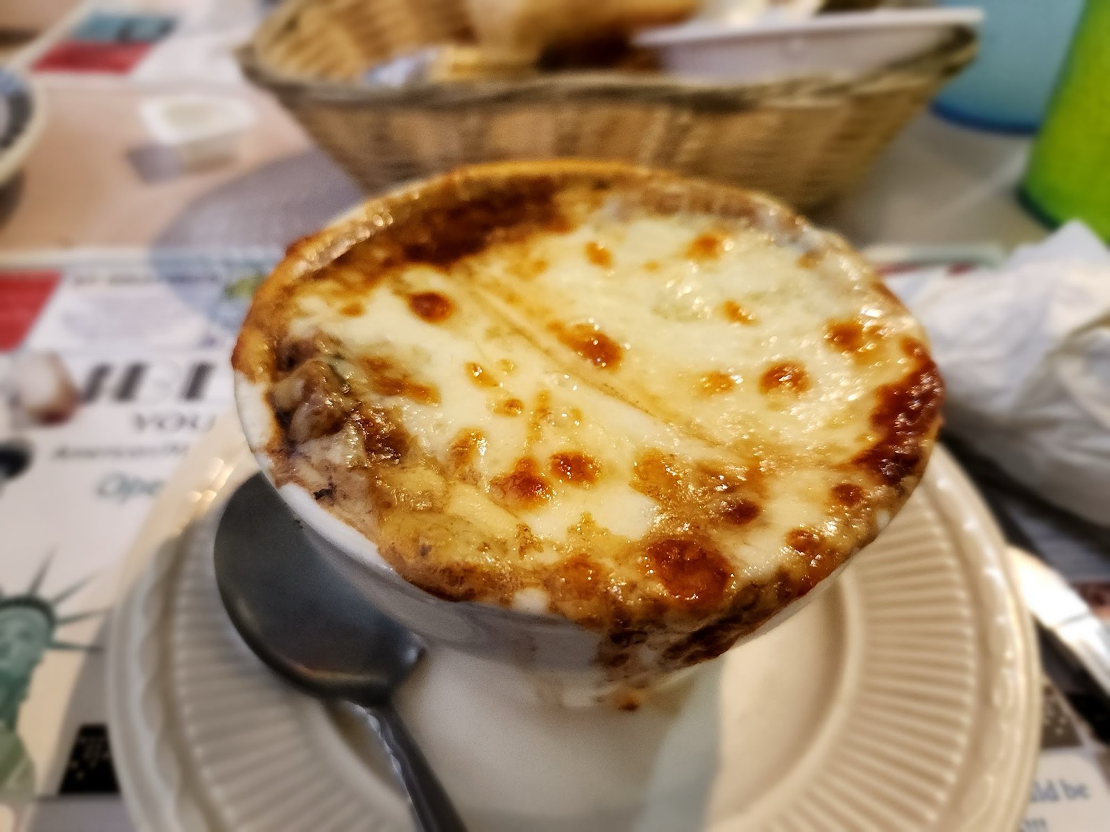 Baked French onion soup crusted with melted cheese