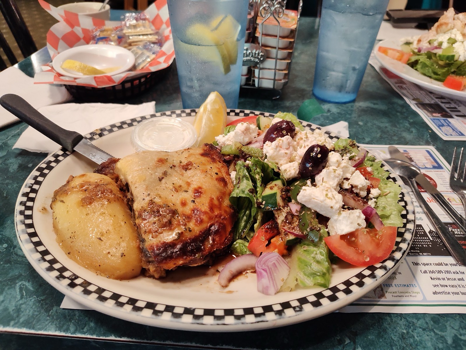 Greek chicken plate with salad, feta and roasted potato