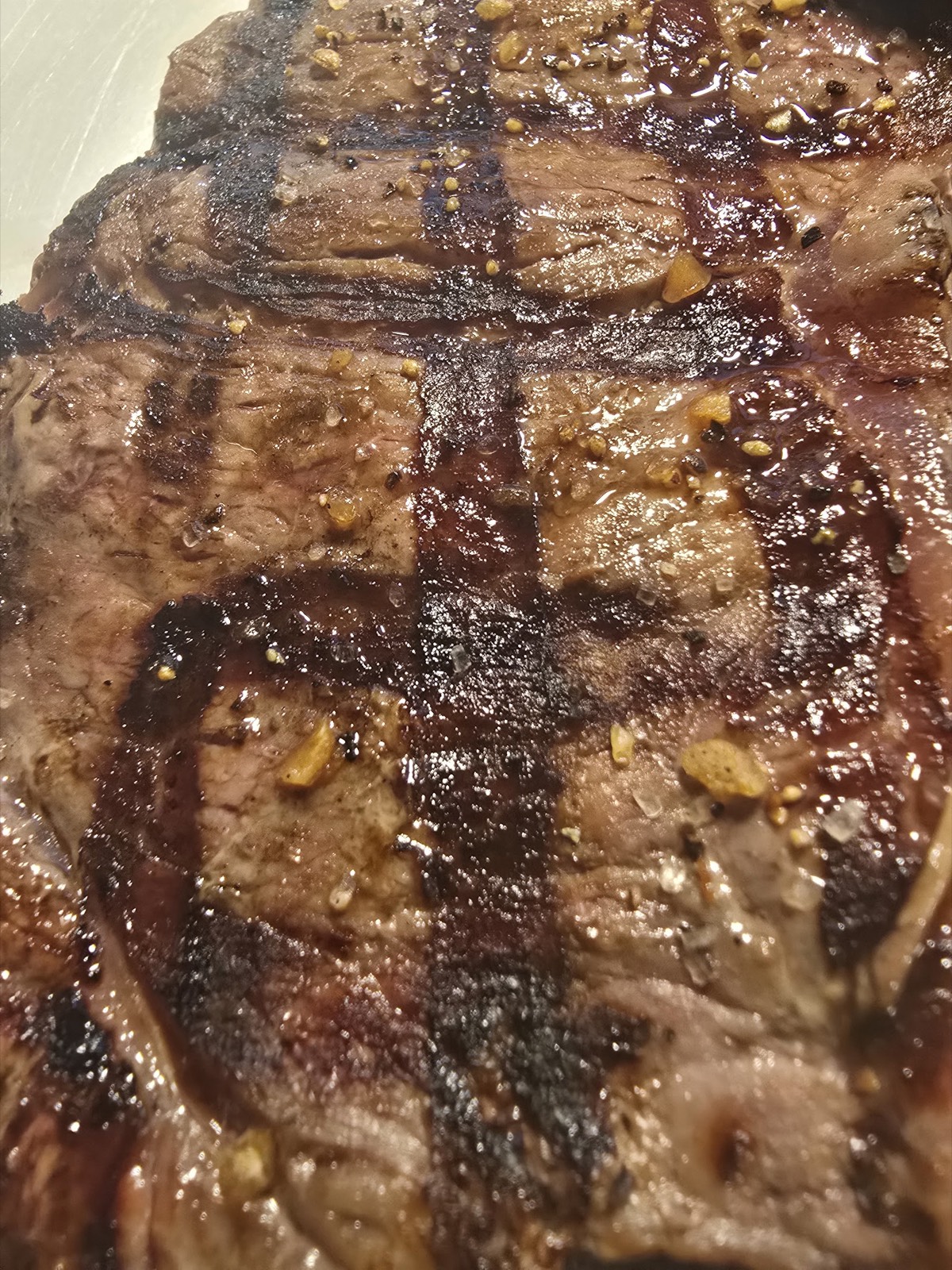 Char-grilled steak up close